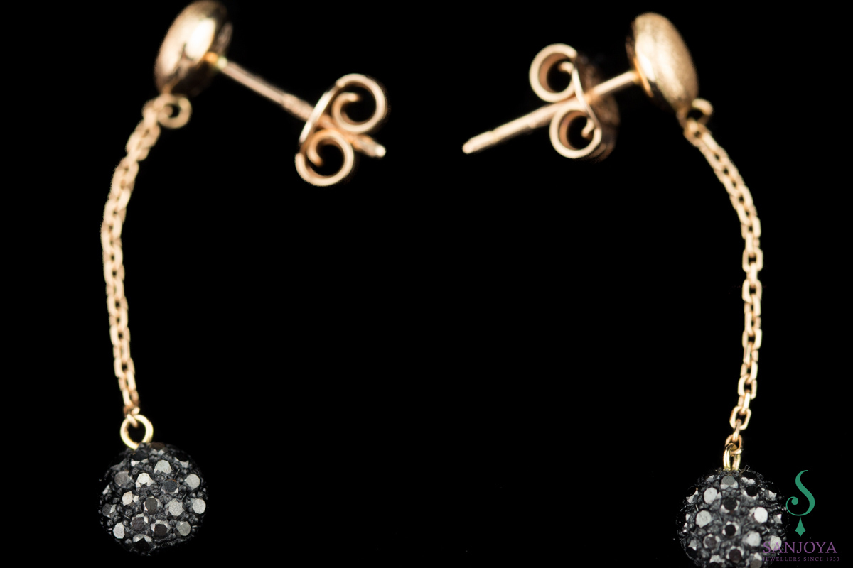 Long rosé 18kt earrings and black brilliant