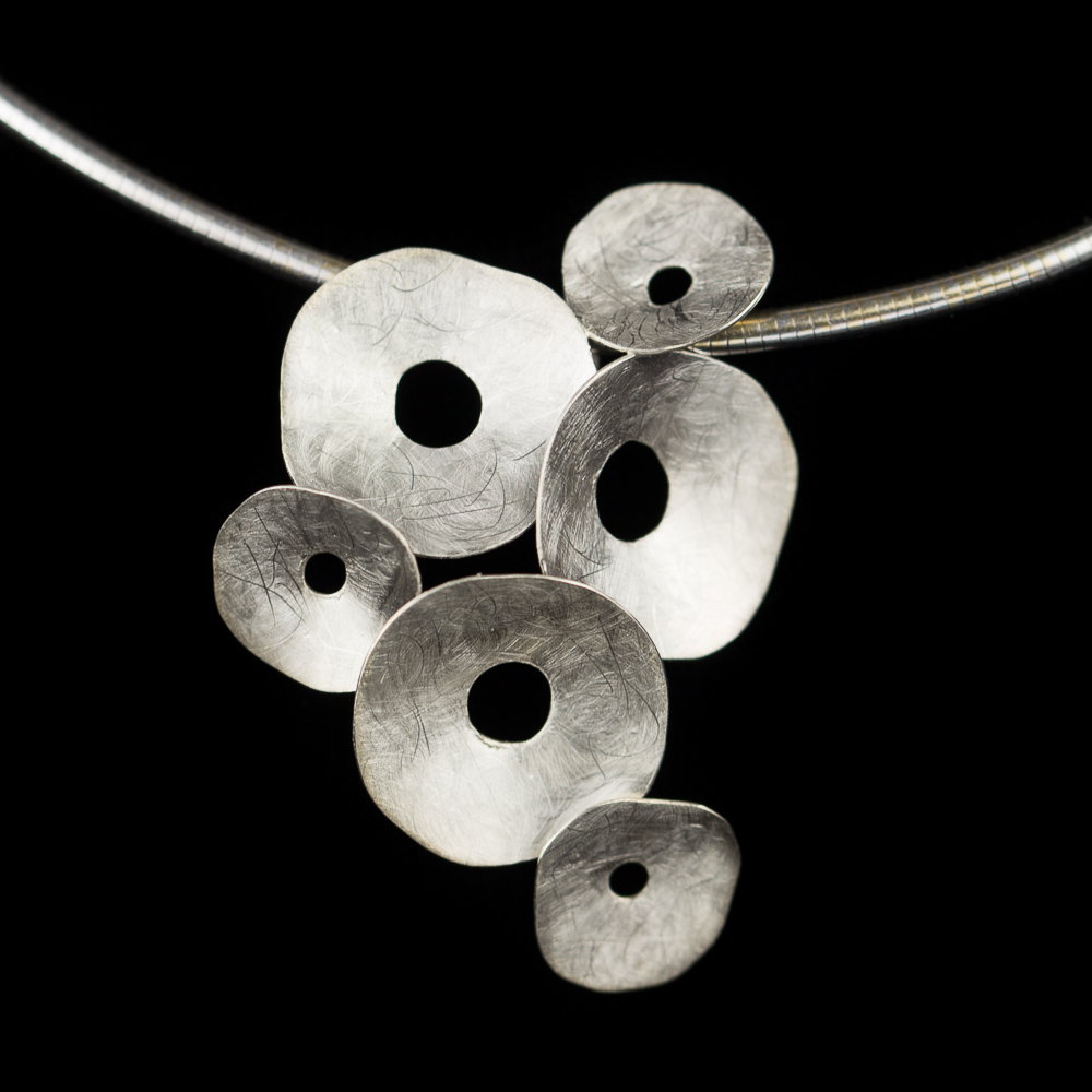 Matt silver pendant with circles and chain