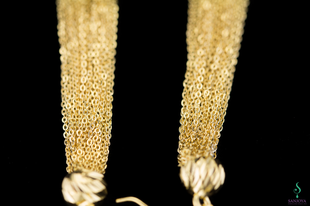 Long gold plated earrings with bundle of silver wires