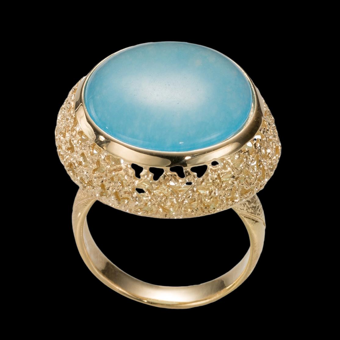 Crafted gold plated ring with a blue quartz stone