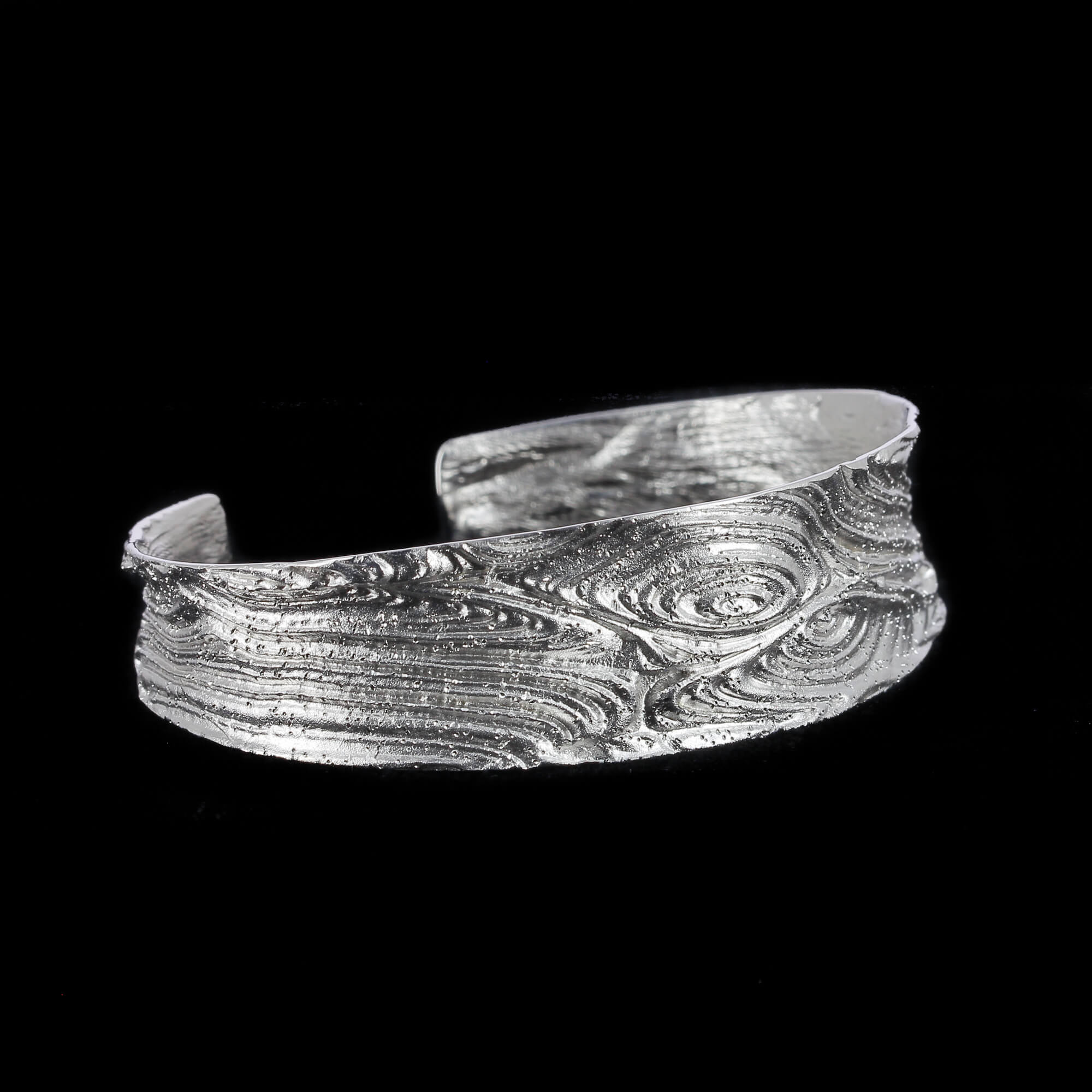 Silver and narrow processed slave bracelet