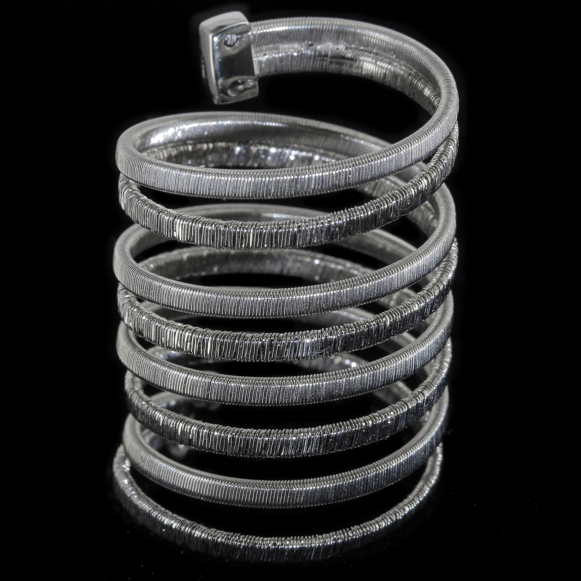 Silver and wide multi-strand ring