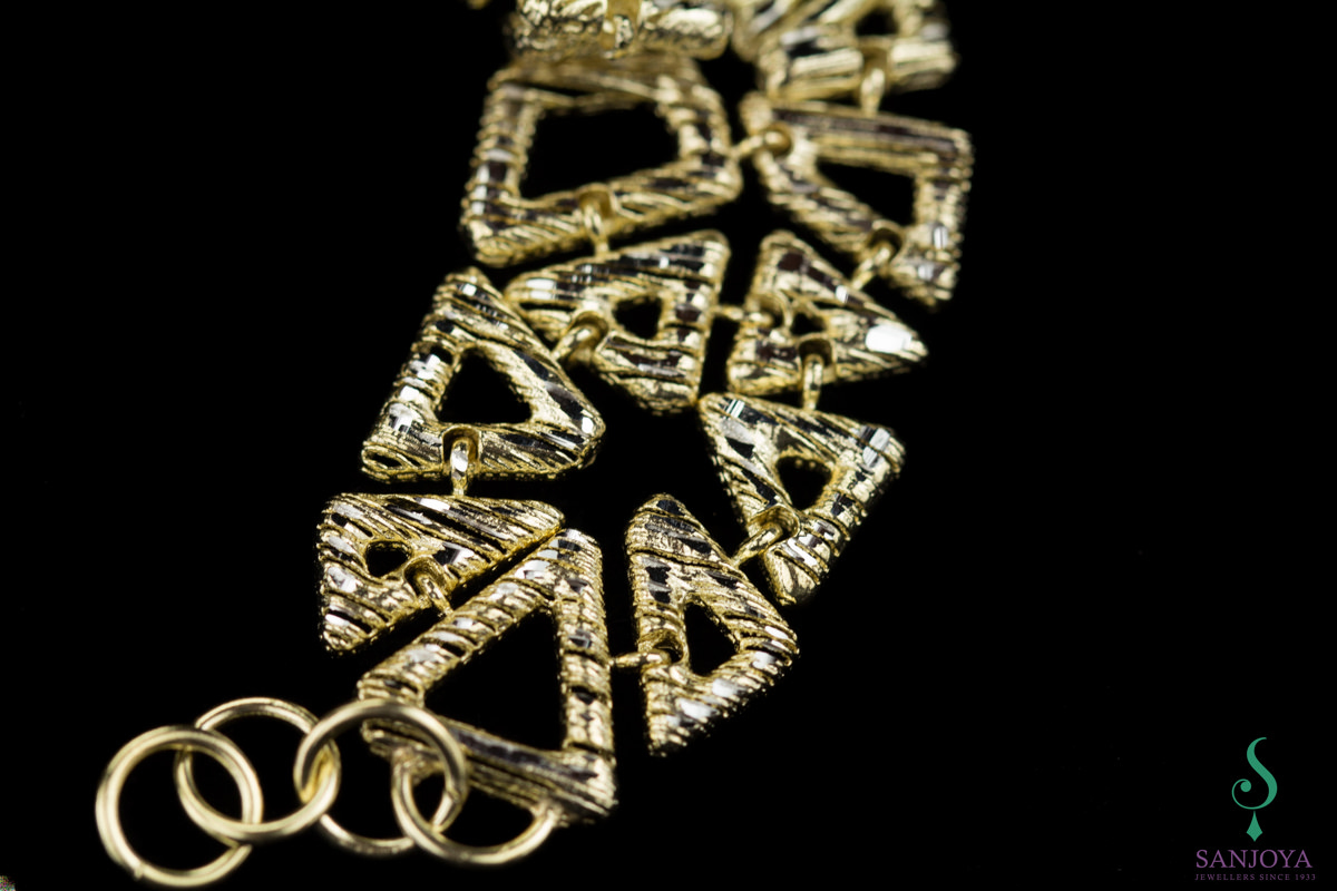 Goldplated bracelet with openworked triangles