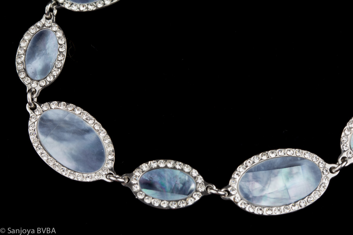 Silver bracelet from blue mother of pearl and zirconia
