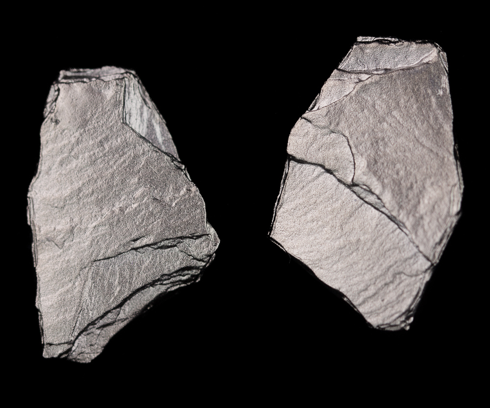 Stone-shaped earrings from dark gray silver