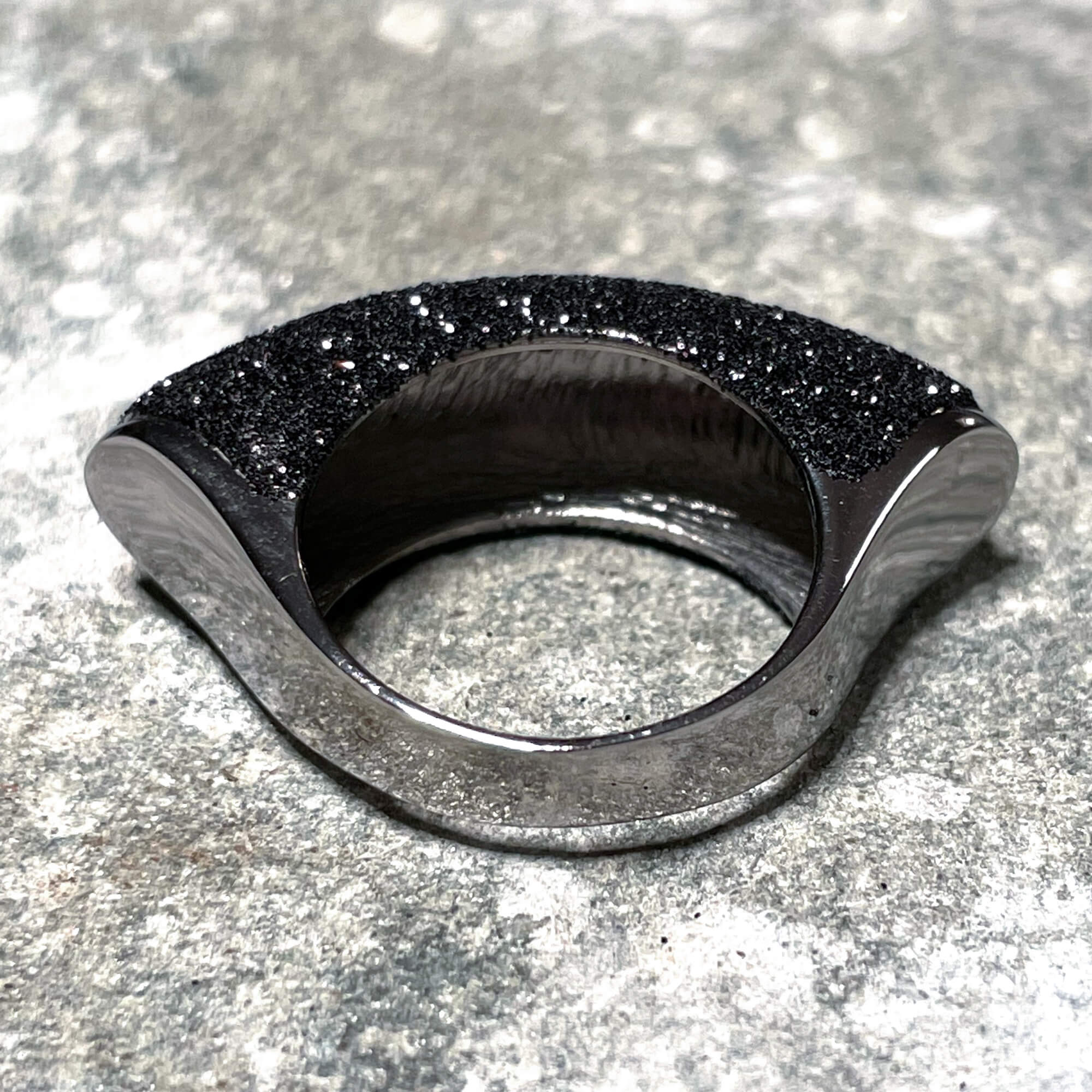 Beautiful and elongated black ring of silver