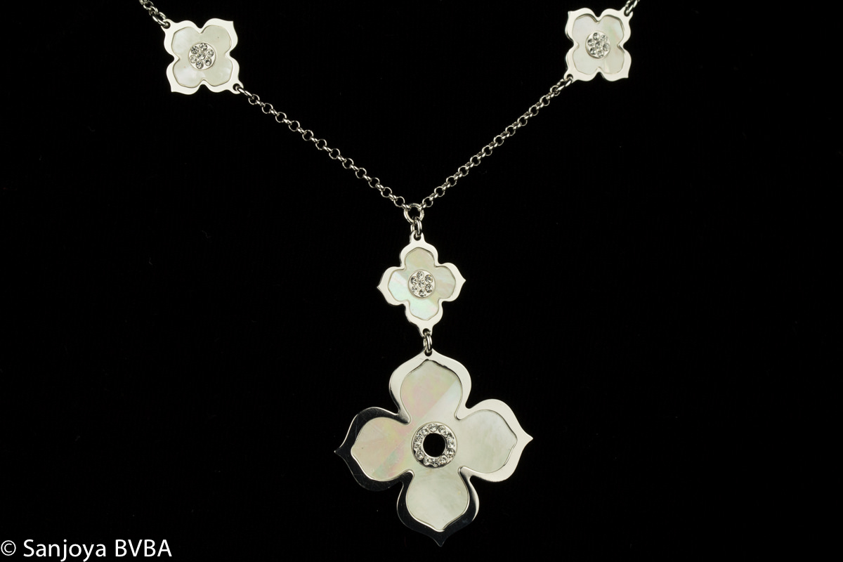 Silver necklace with flowers and decorated pendant