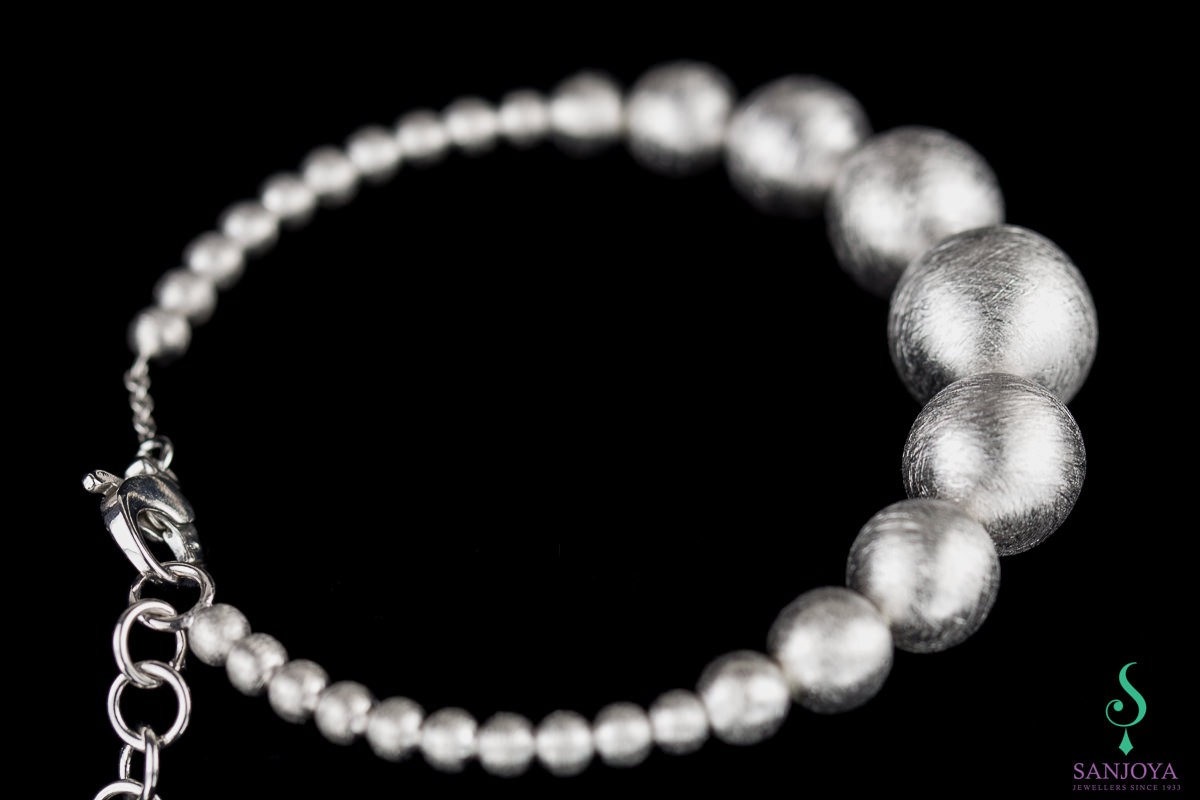 ART0216009 - Zilveren armband met kleine en grotere bollen