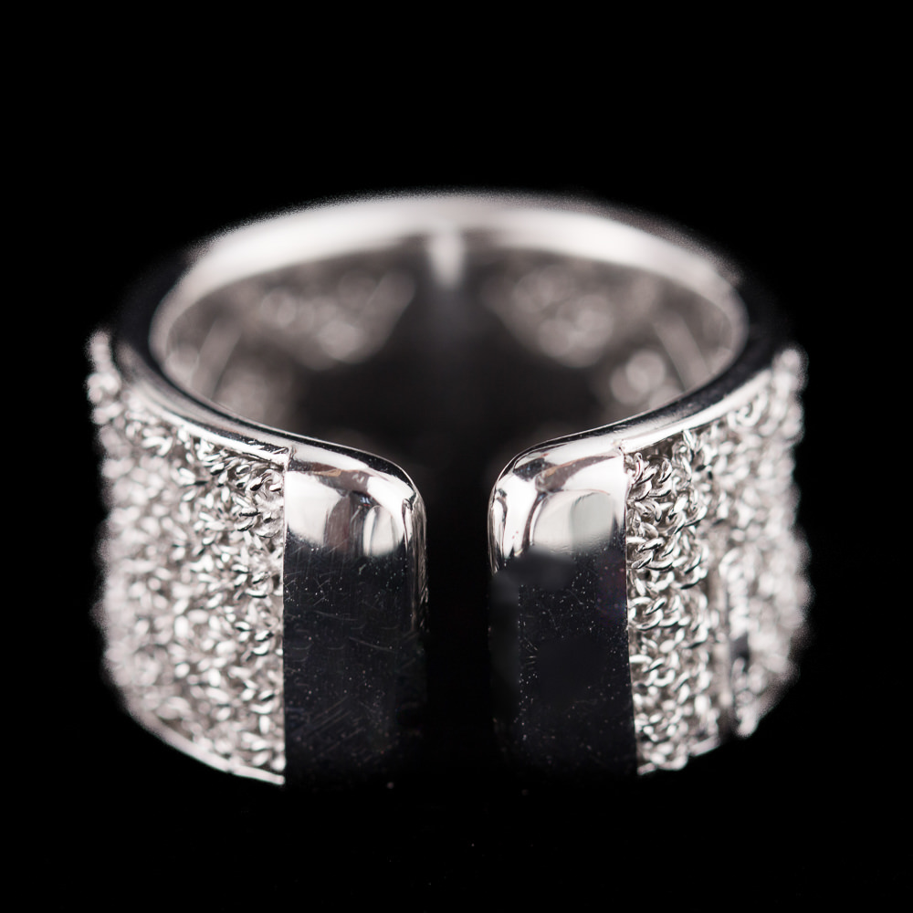 Special open ring of interwoven silver