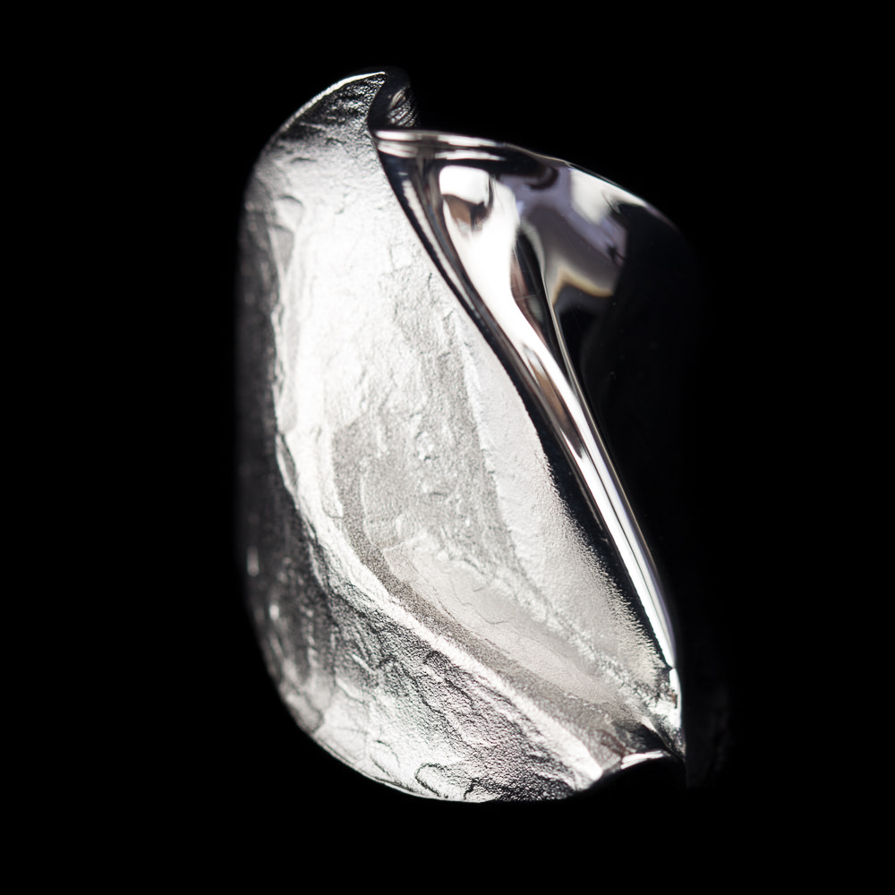 Wide fancy silver ring; matt and polished