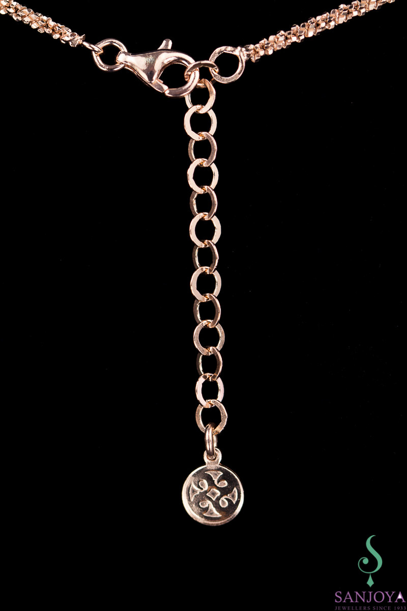 Rose gold necklace with black sparkling pendant