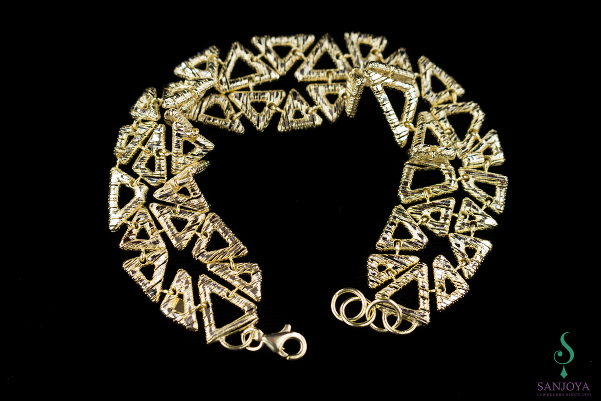 Goldplated bracelet with openworked triangles