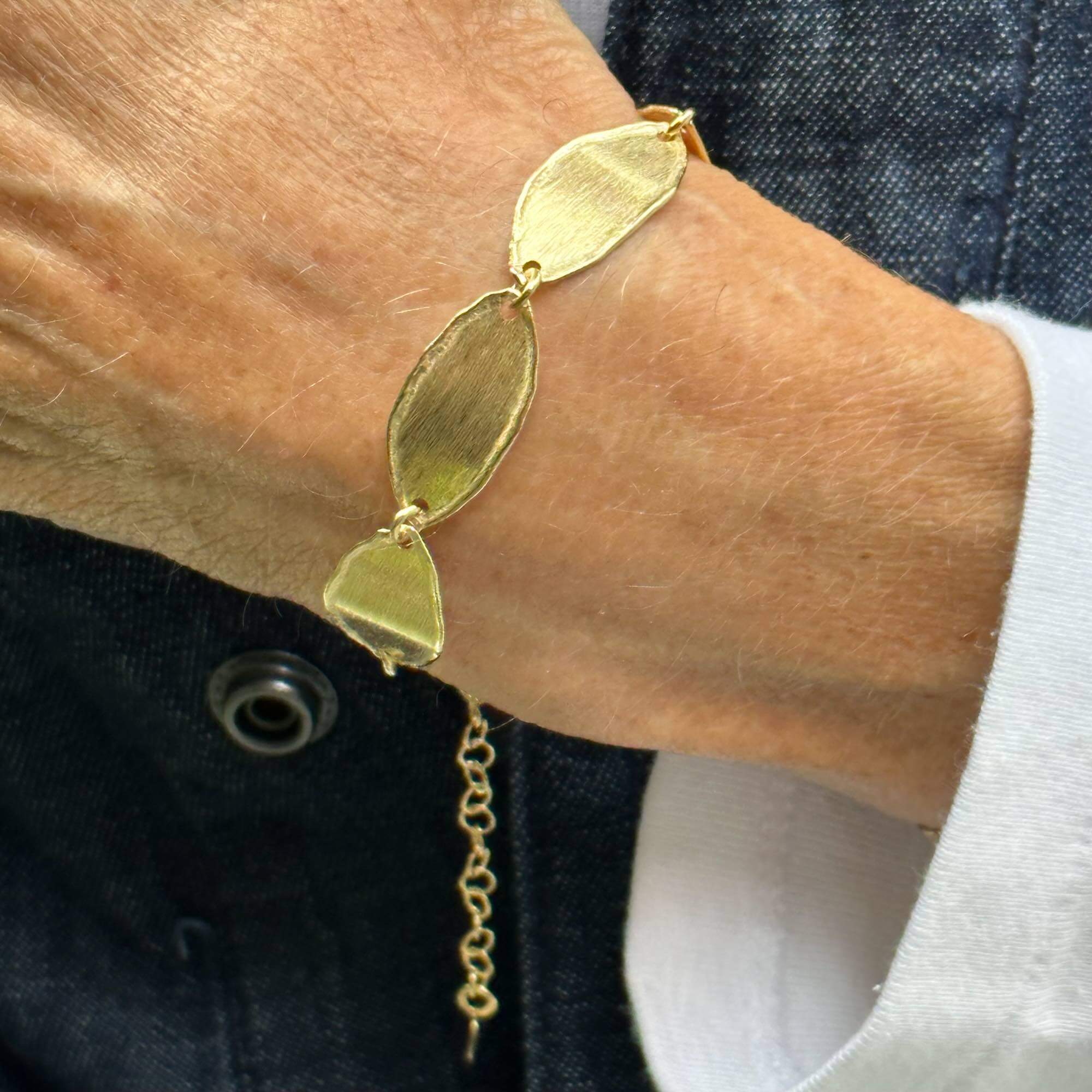 Gold-plated and oval-shaped bracelet