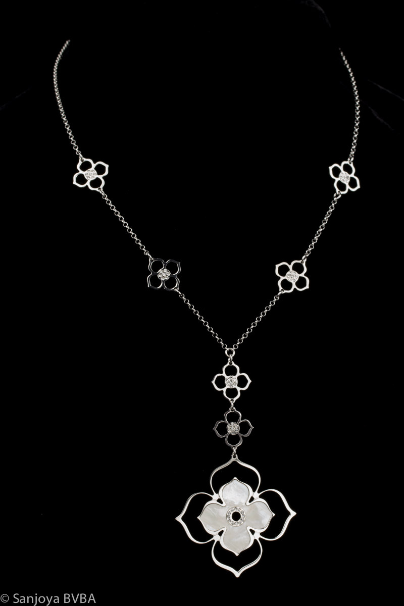 Silver chain with open flower pendant