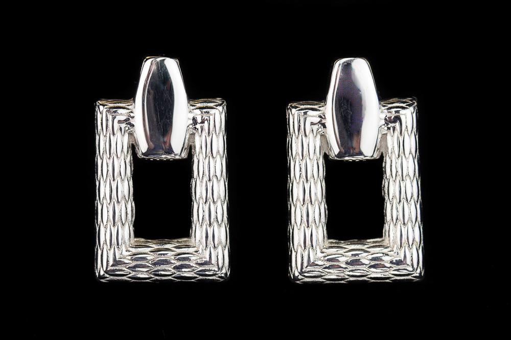 Rectangular and processed silver earrings