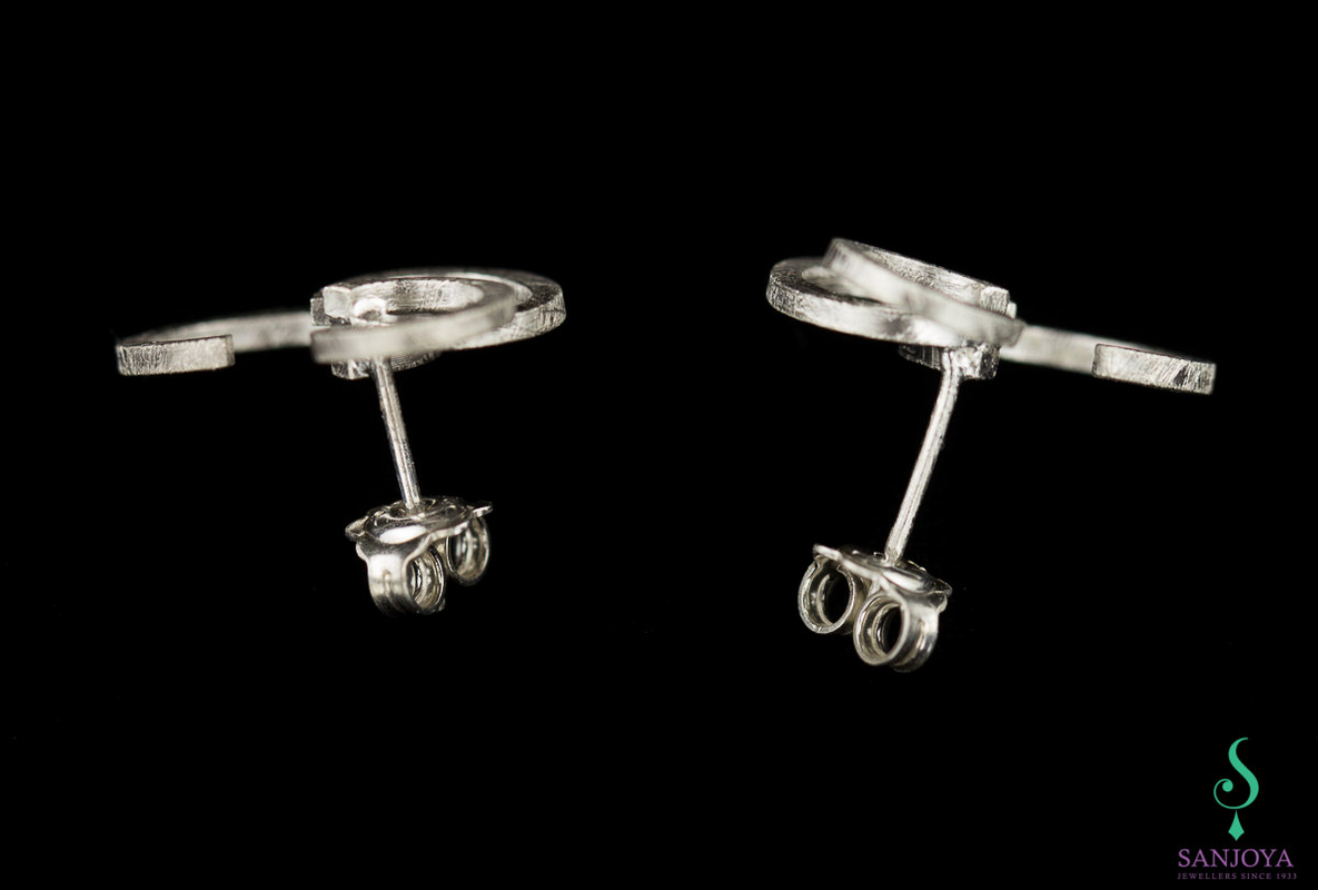 Teardrop and small silver earrings