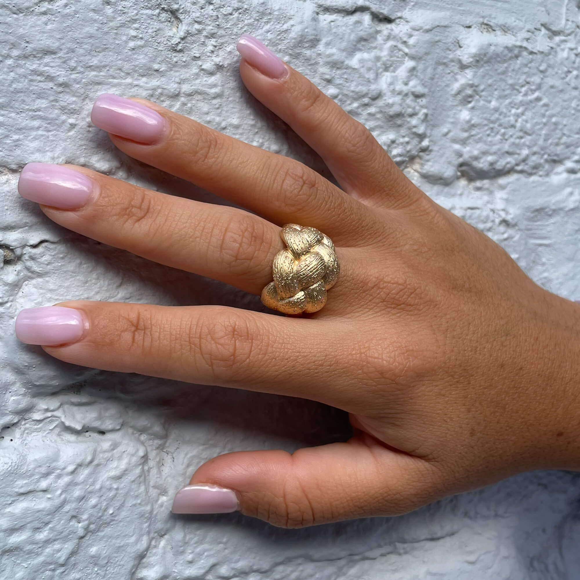 Beautiful gold plated and braided ring