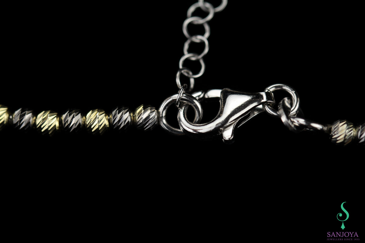 Italian two-tone gold bracelet, varying thicknesses