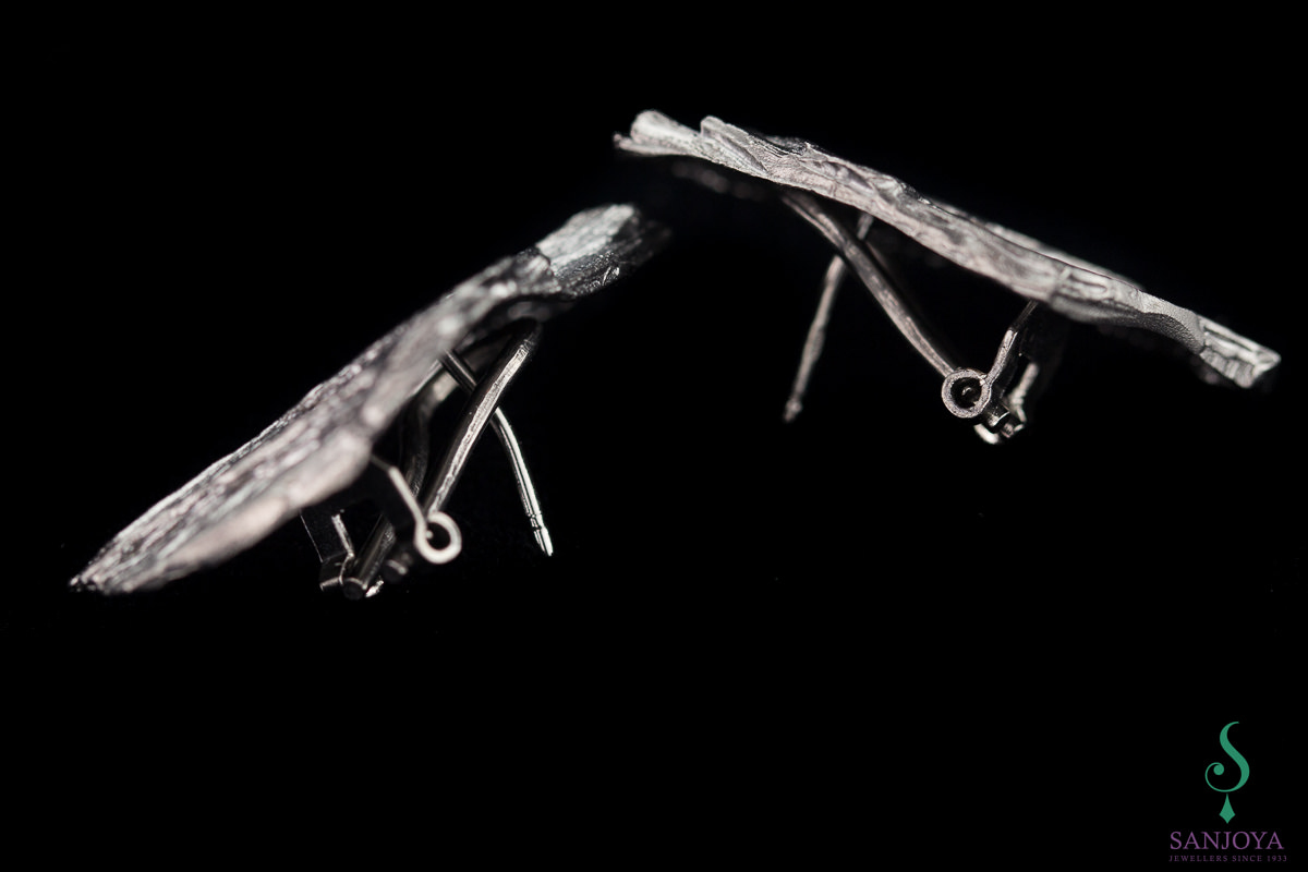 Stone-shaped earrings from dark gray silver