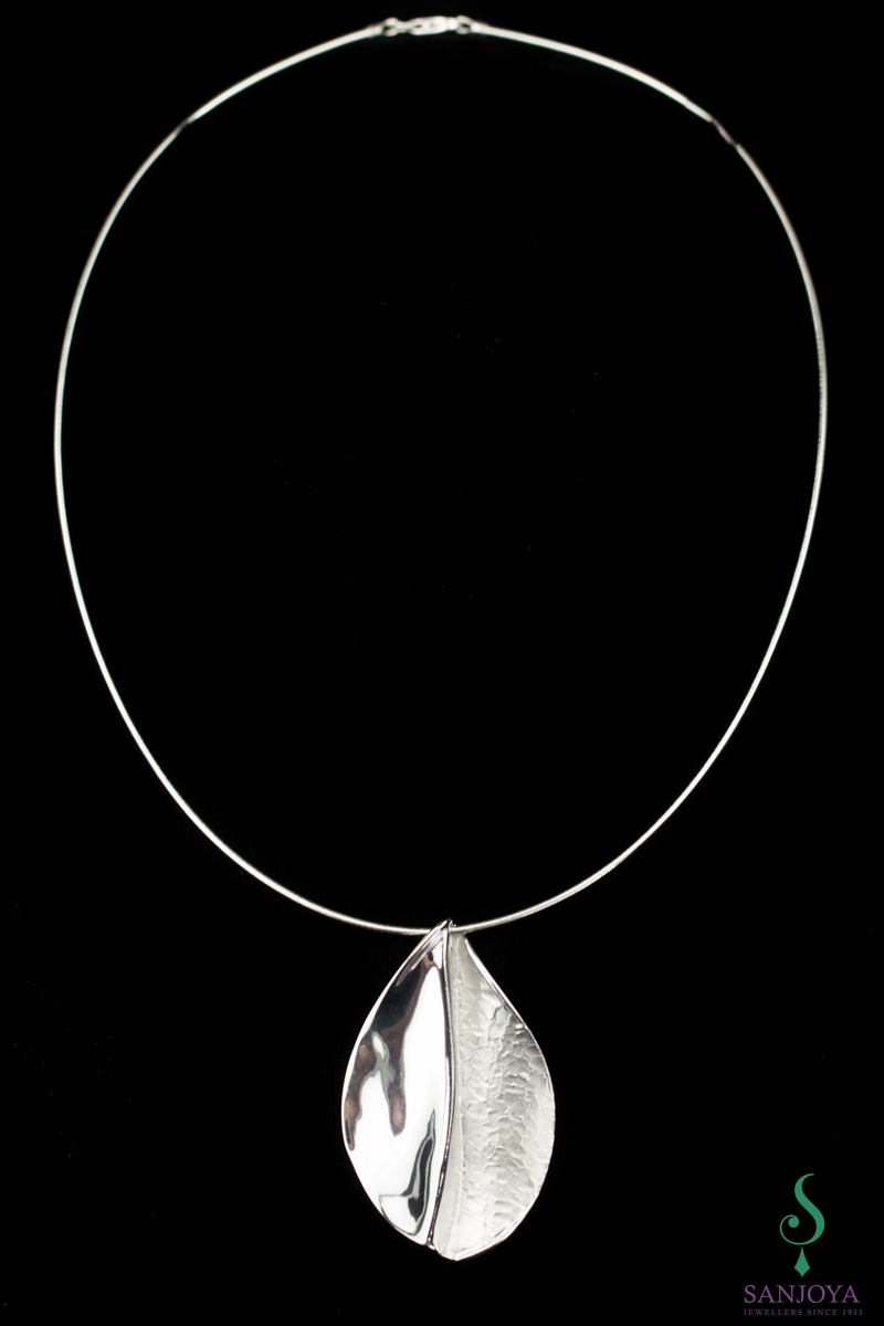 Polished silver pendant without chain