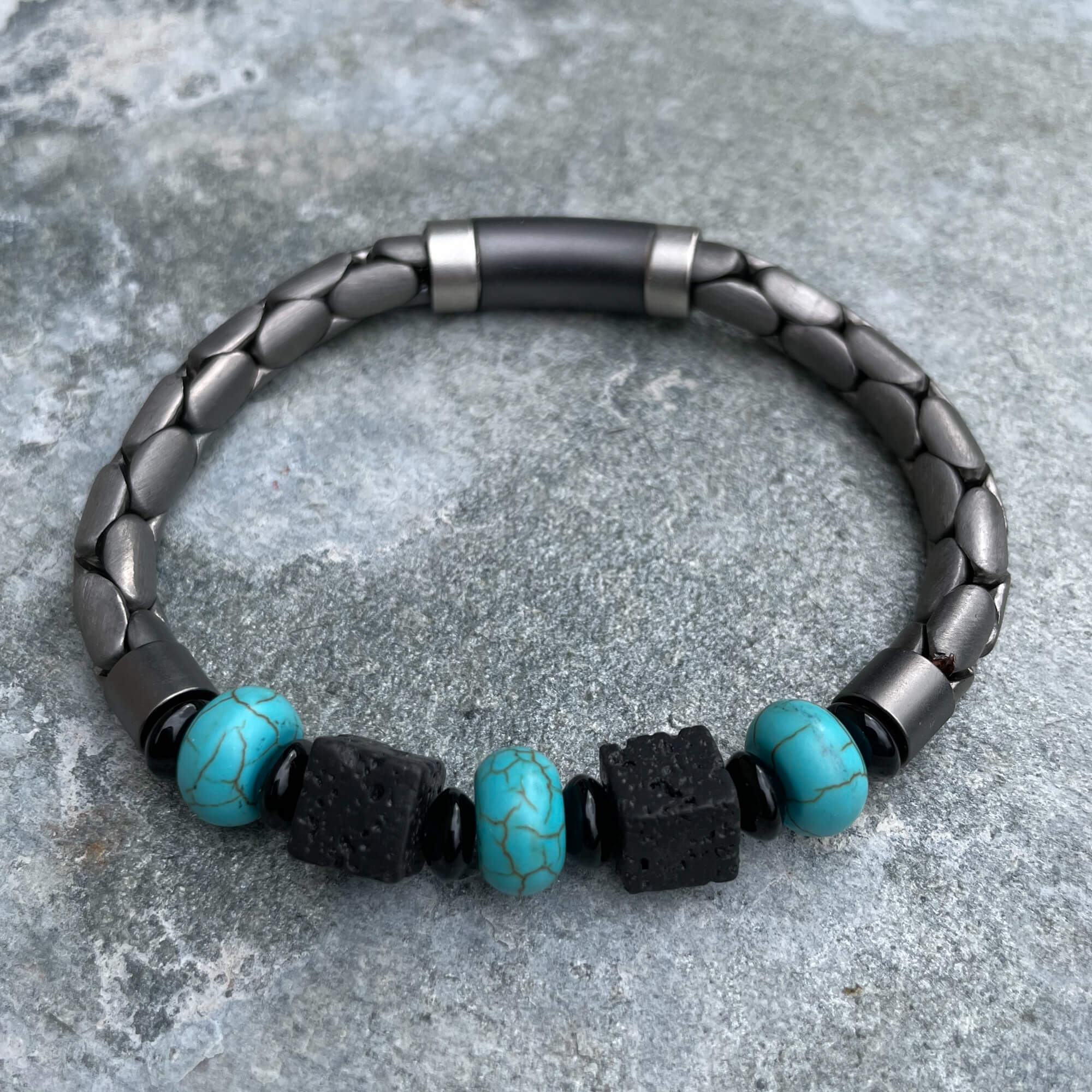 Gray bracelet with turcuoise and black stones