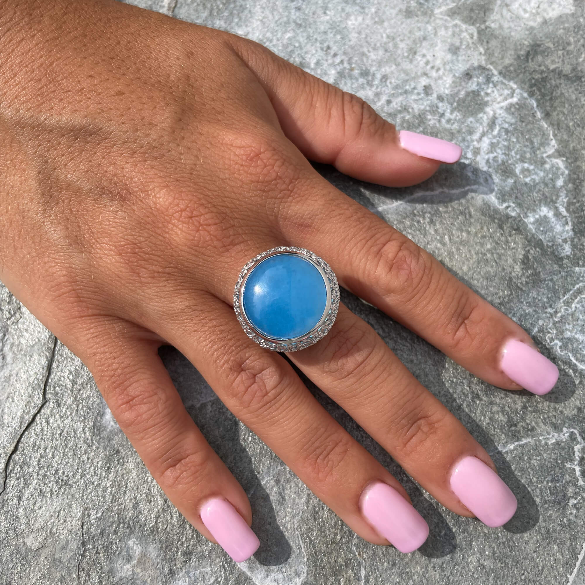 Worked silver ring with a blue quartz stone