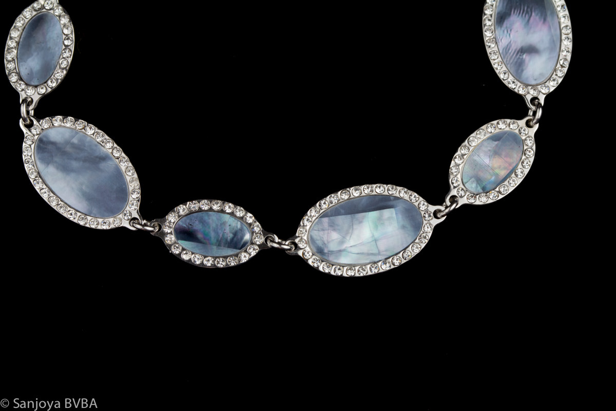 Silver bracelet from blue mother of pearl and zirconia