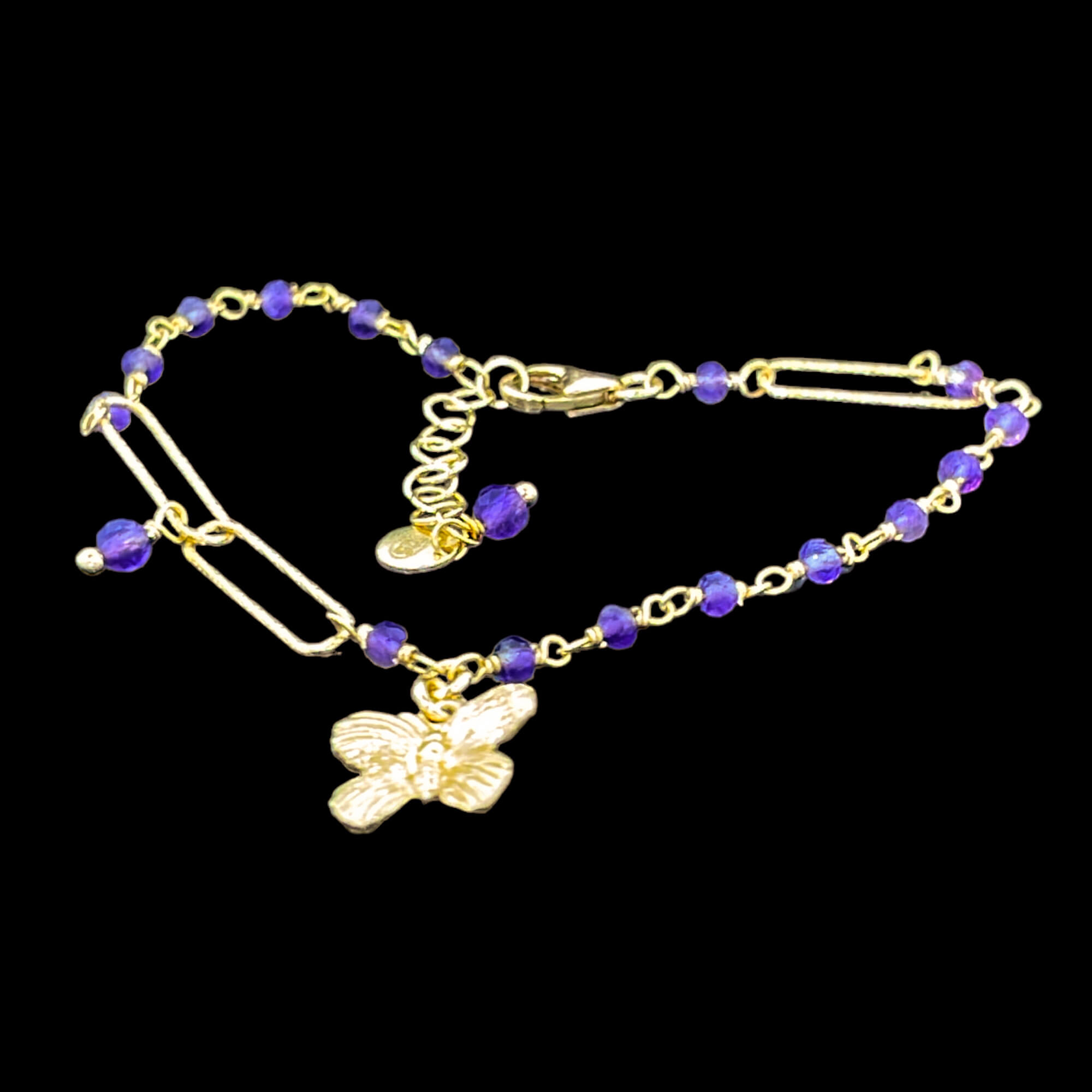 Gold-plated bracelet with amethyst stones and a butterfly