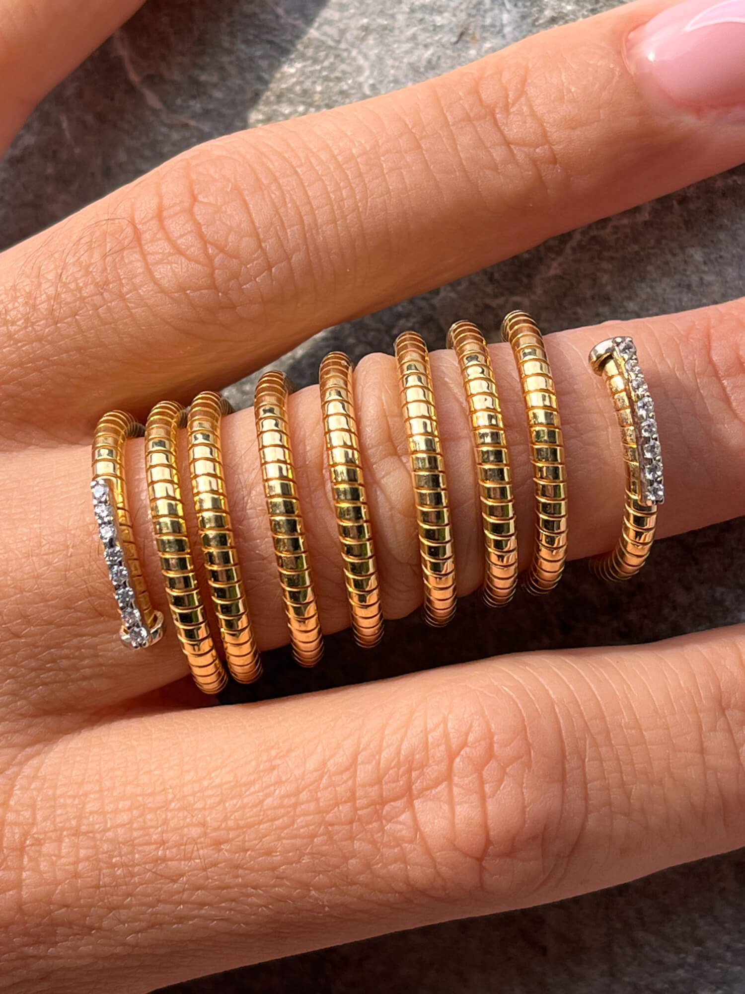 Gold-plated and spiral ring with zirconia