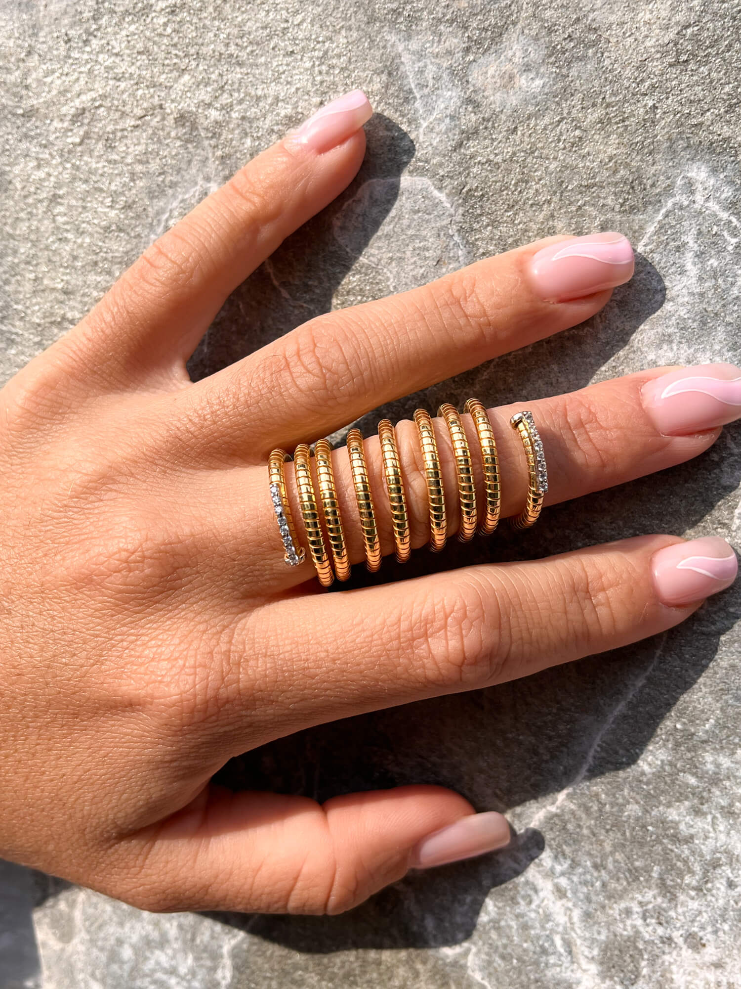 Gold-plated and spiral ring with zirconia