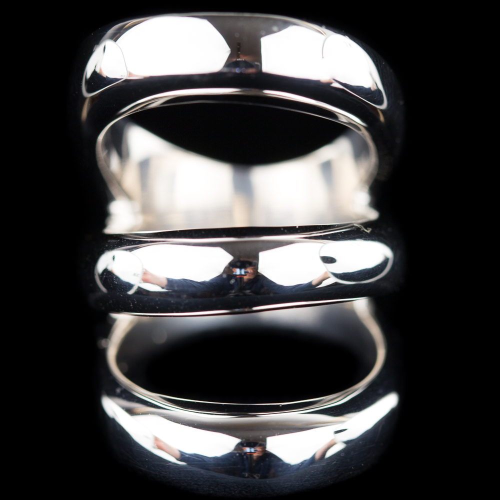 Silver ring, shiny and three rows