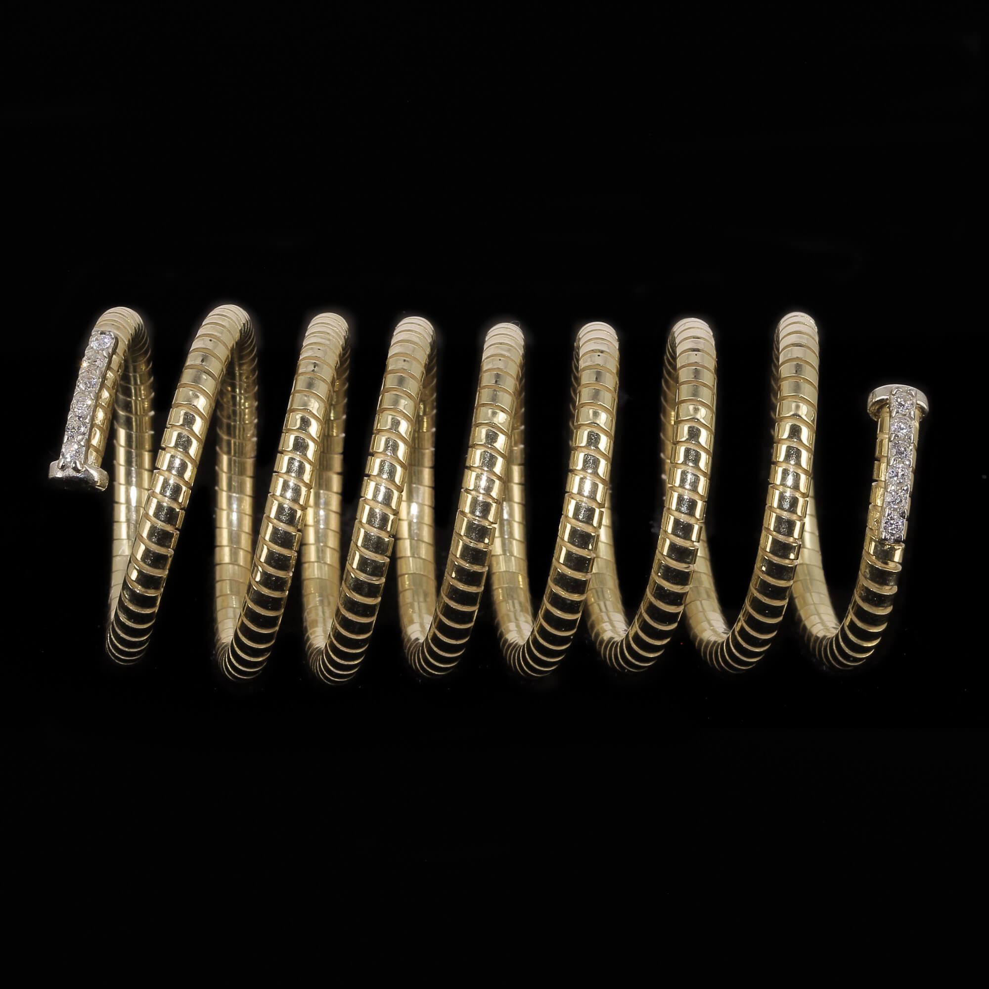 Gold plated and spiral ring with zirconia