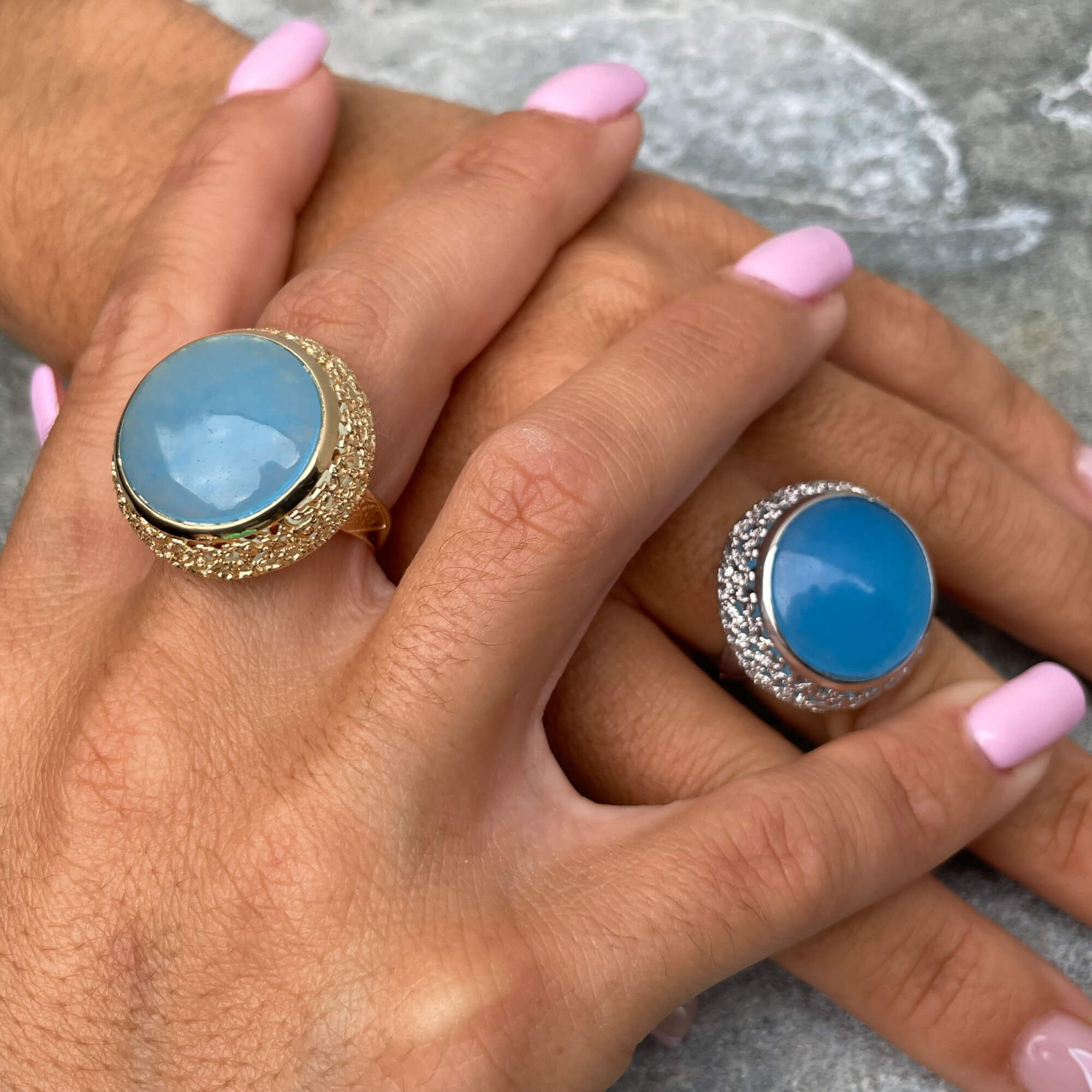 Decorated gold-plated ring with a blue quartz stone