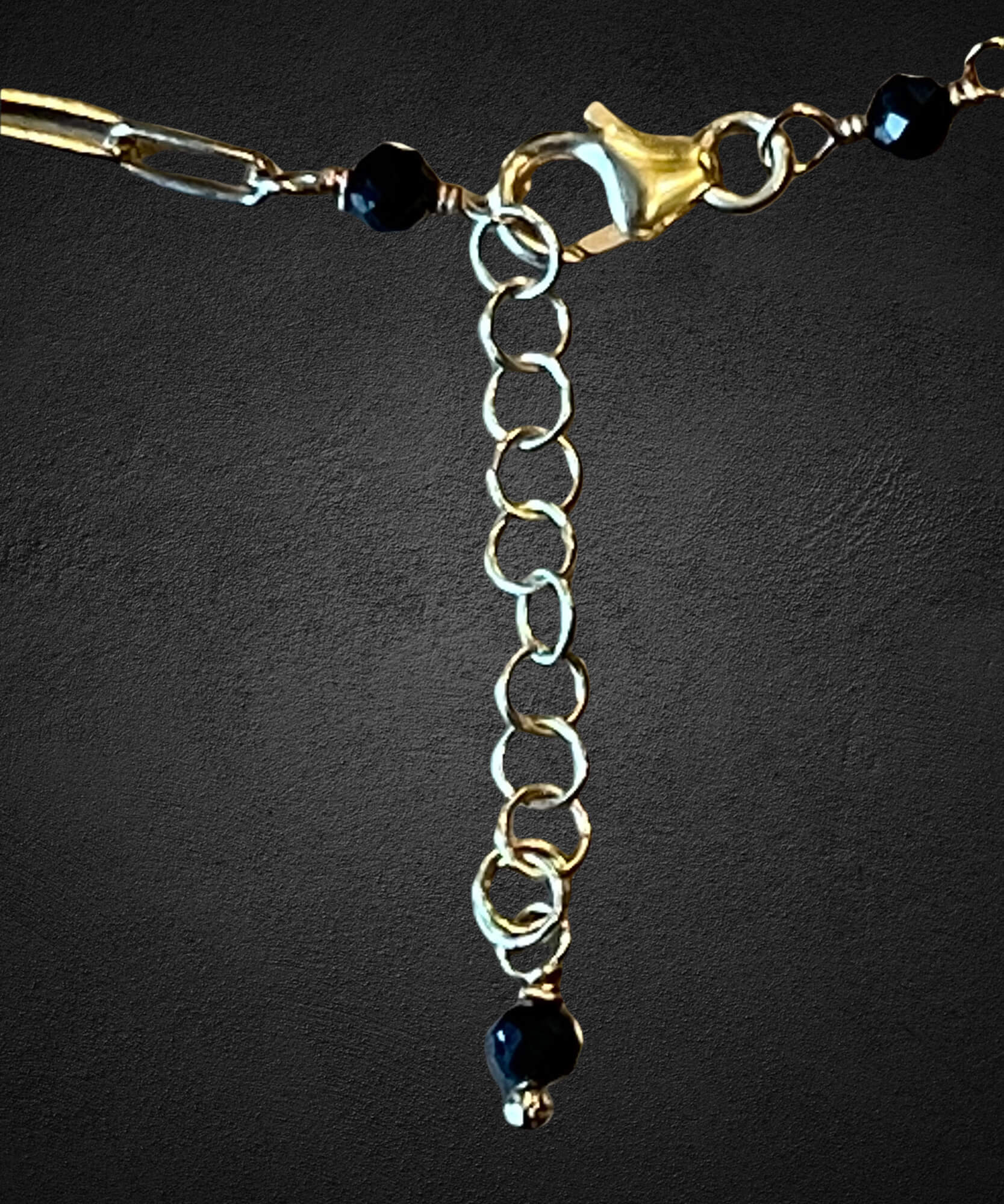 Gold-plated link chain with 2 onyx stones