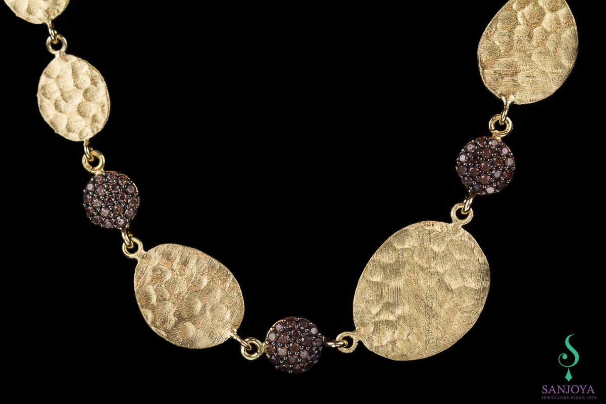 Mat gold plated necklace with brown zirconia stones