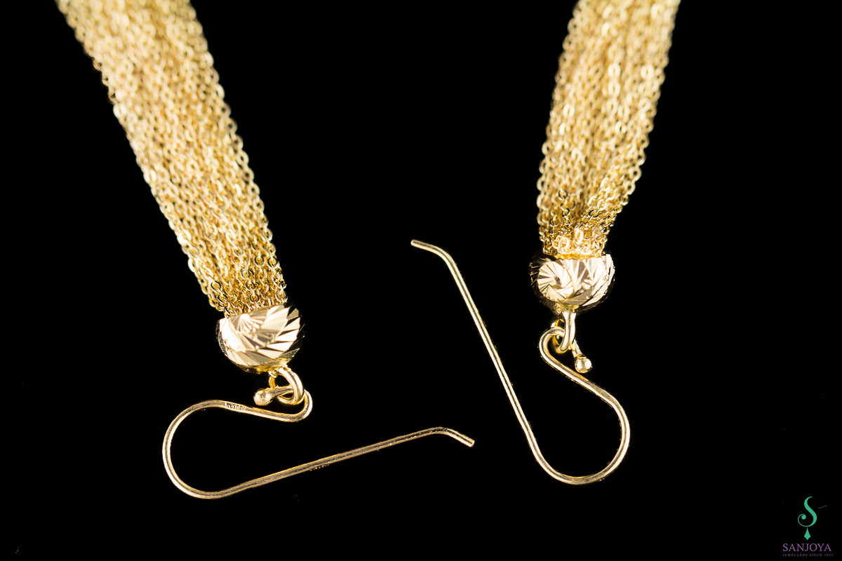 Long gold plated earrings with bundle of silver wires