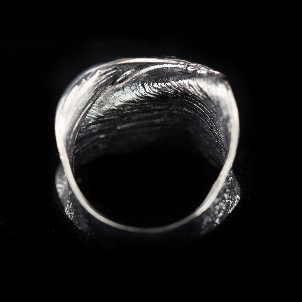Silver narrow gray ring with diamond cut