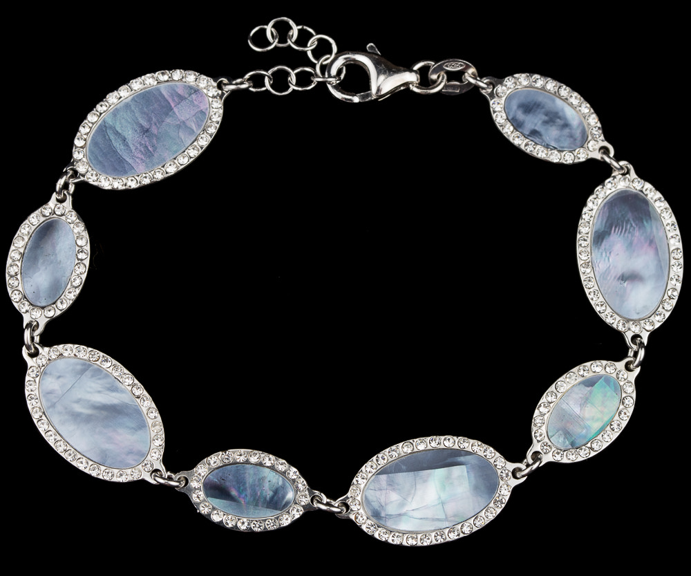 Silver bracelet from blue mother of pearl and zirconia