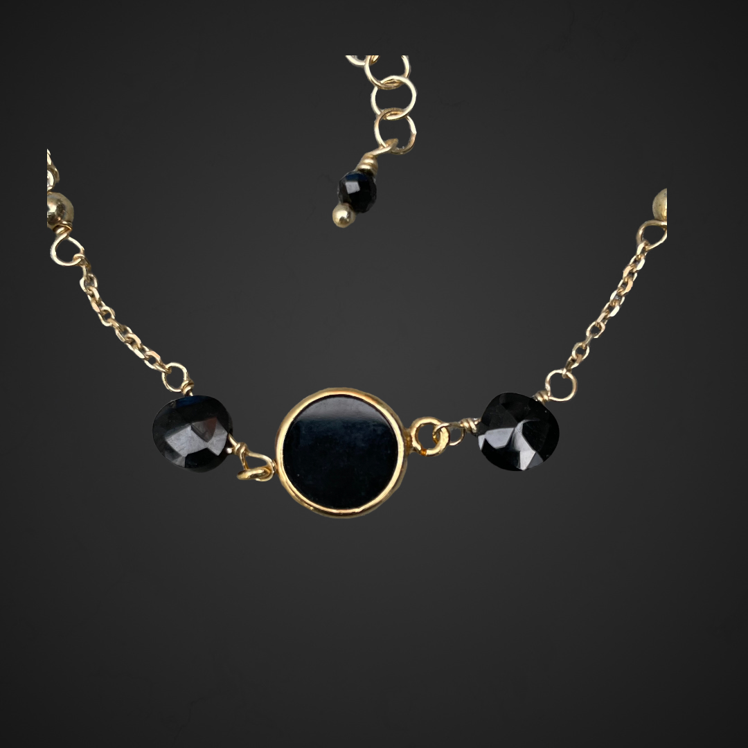 Gold-plated bracelet with onyx stones
