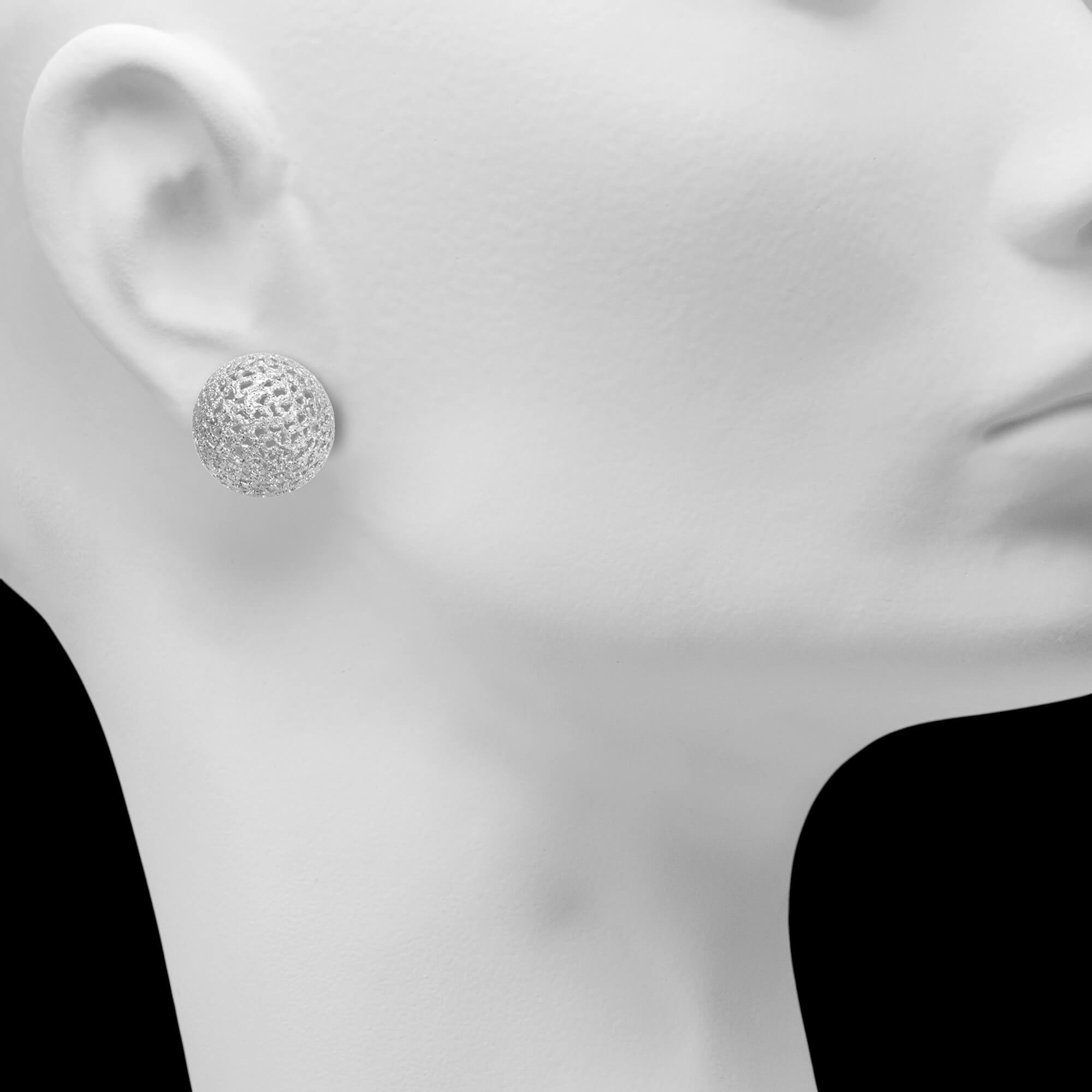 Large Dome-Shaped Silver Earrings with Open Circles