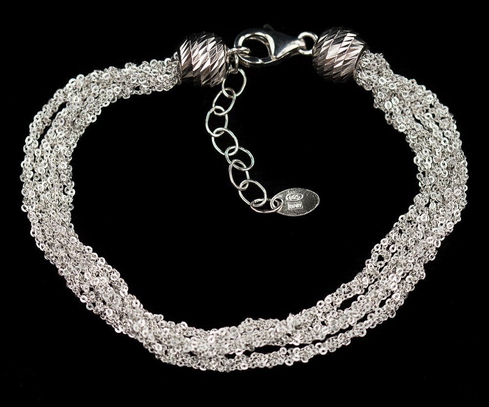 Four beautiful interwoven silver bracelets