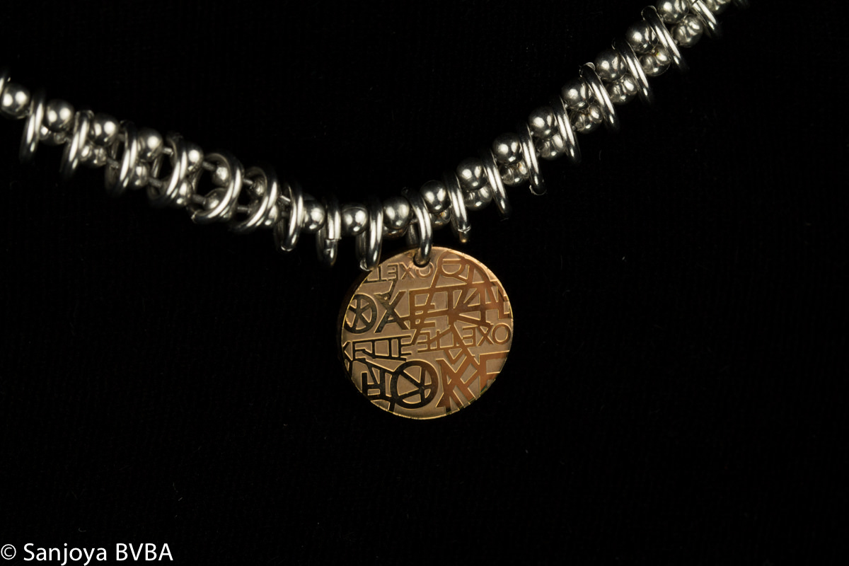 OX0913025 - Edelstalen ketting met rondvormig rosé hangertje