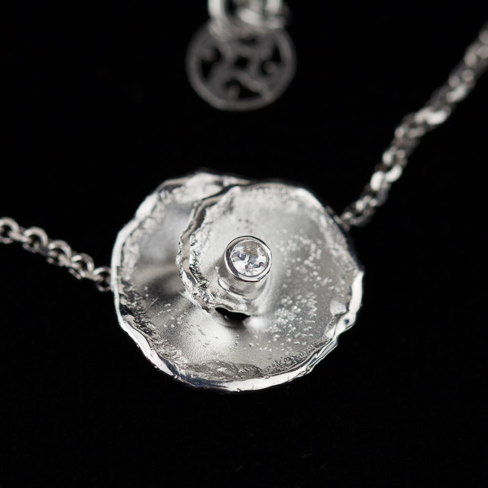 Silver necklace with flower