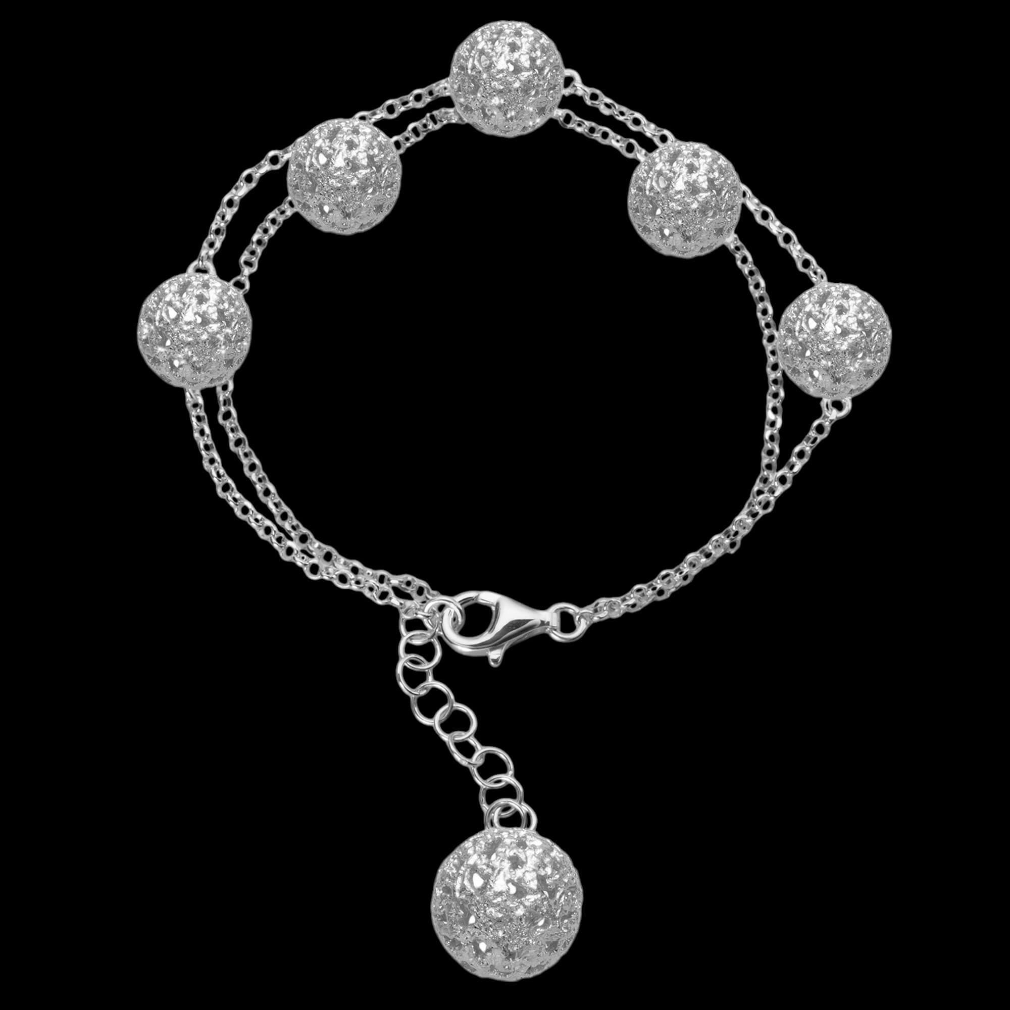 Zilveren armband met enkele transparante bolletjes