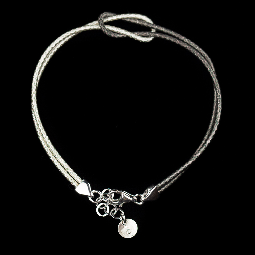 Refined white silver bracelet with an infinity knot, 2mm