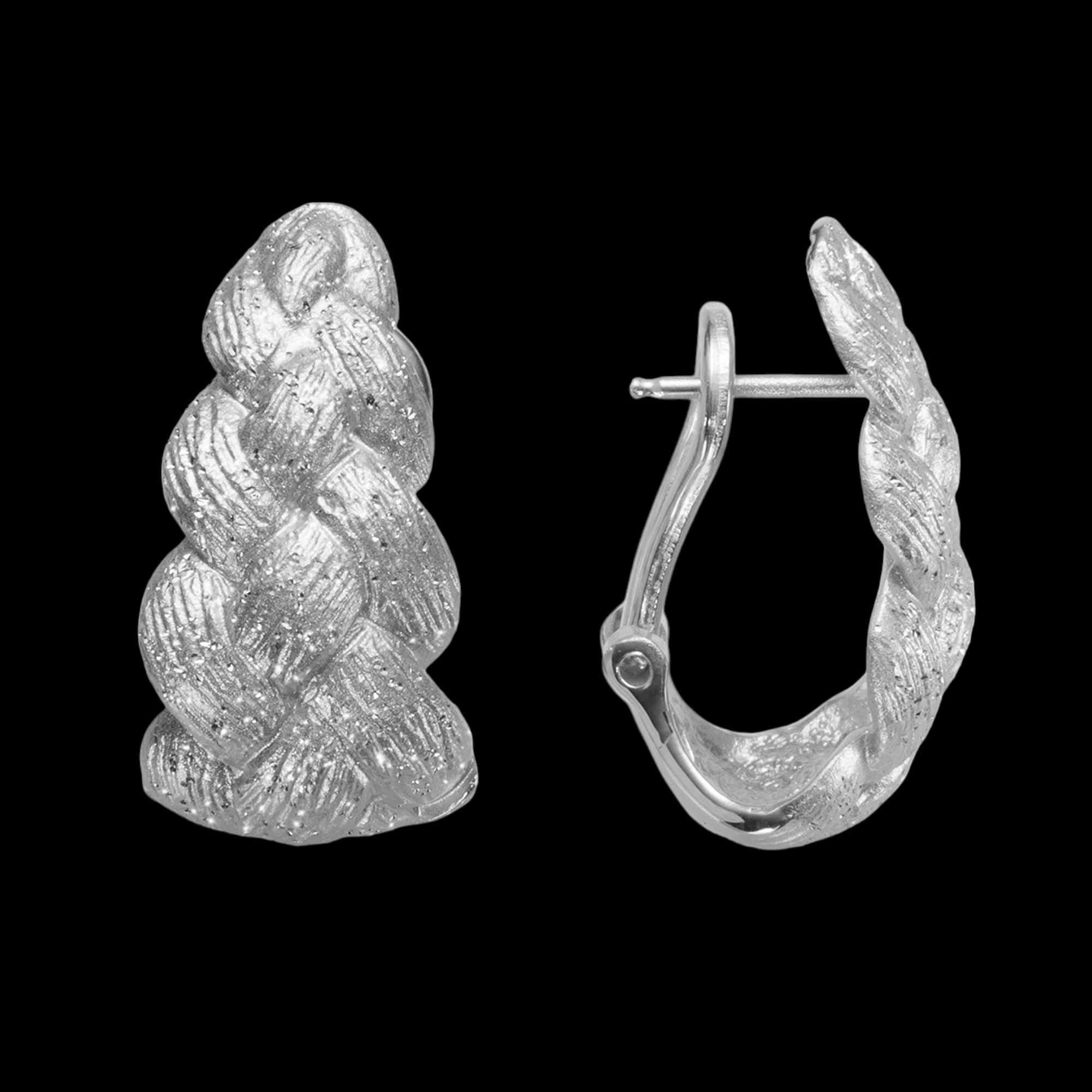 Wunderschöne silberne und geflochtene Ohrclips