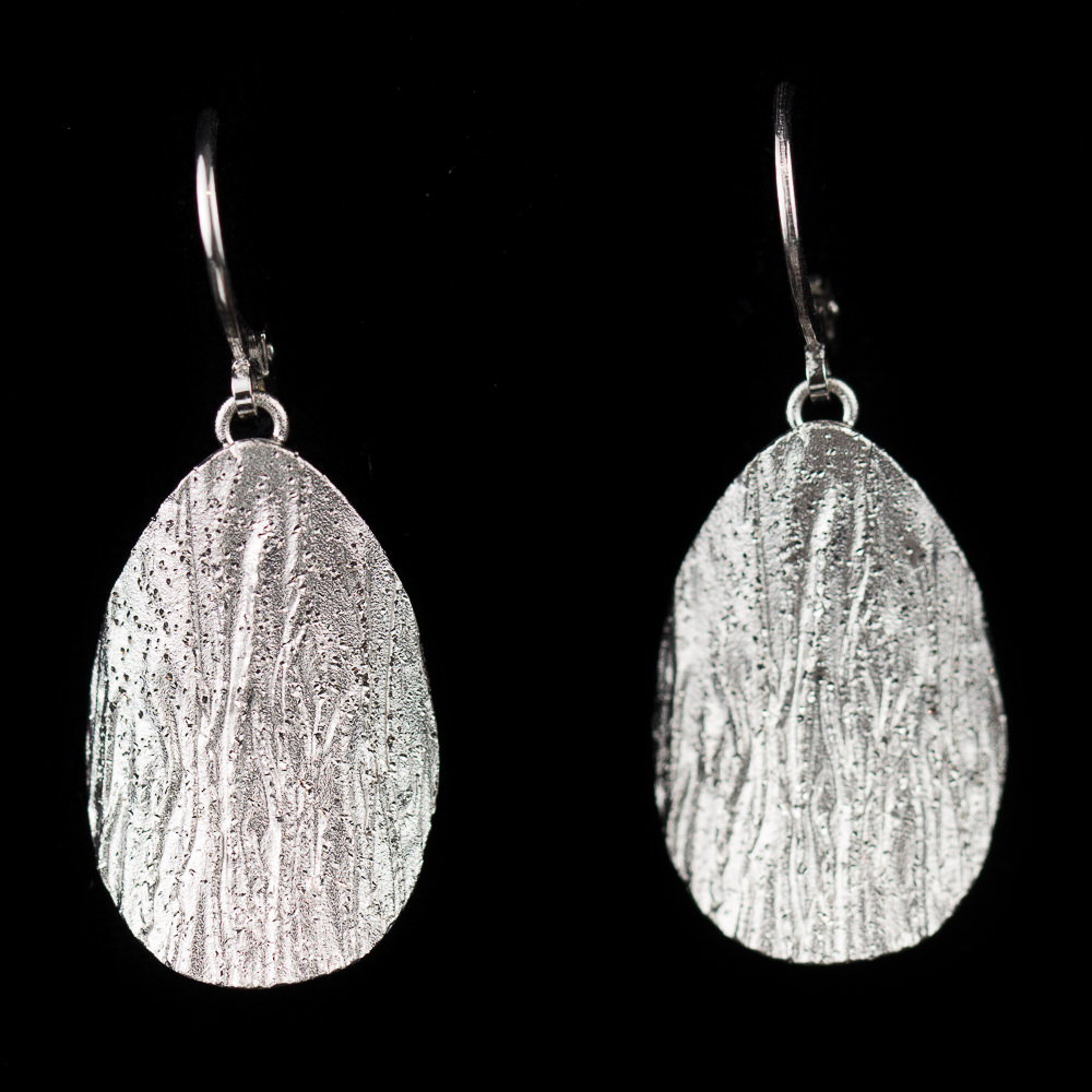 Silver dependent and oval diamanted earrings