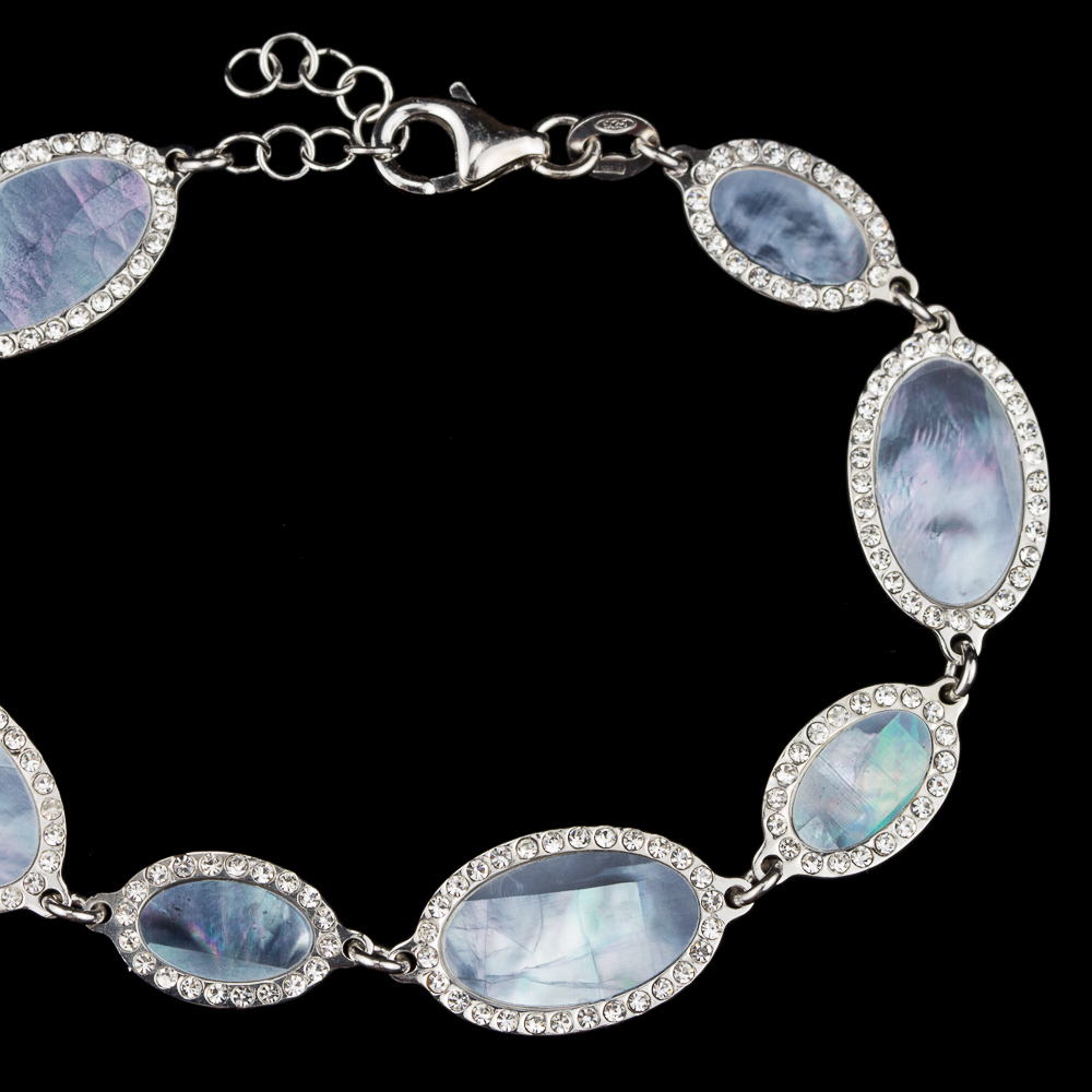 Silver bracelet from blue mother of pearl and zirconia