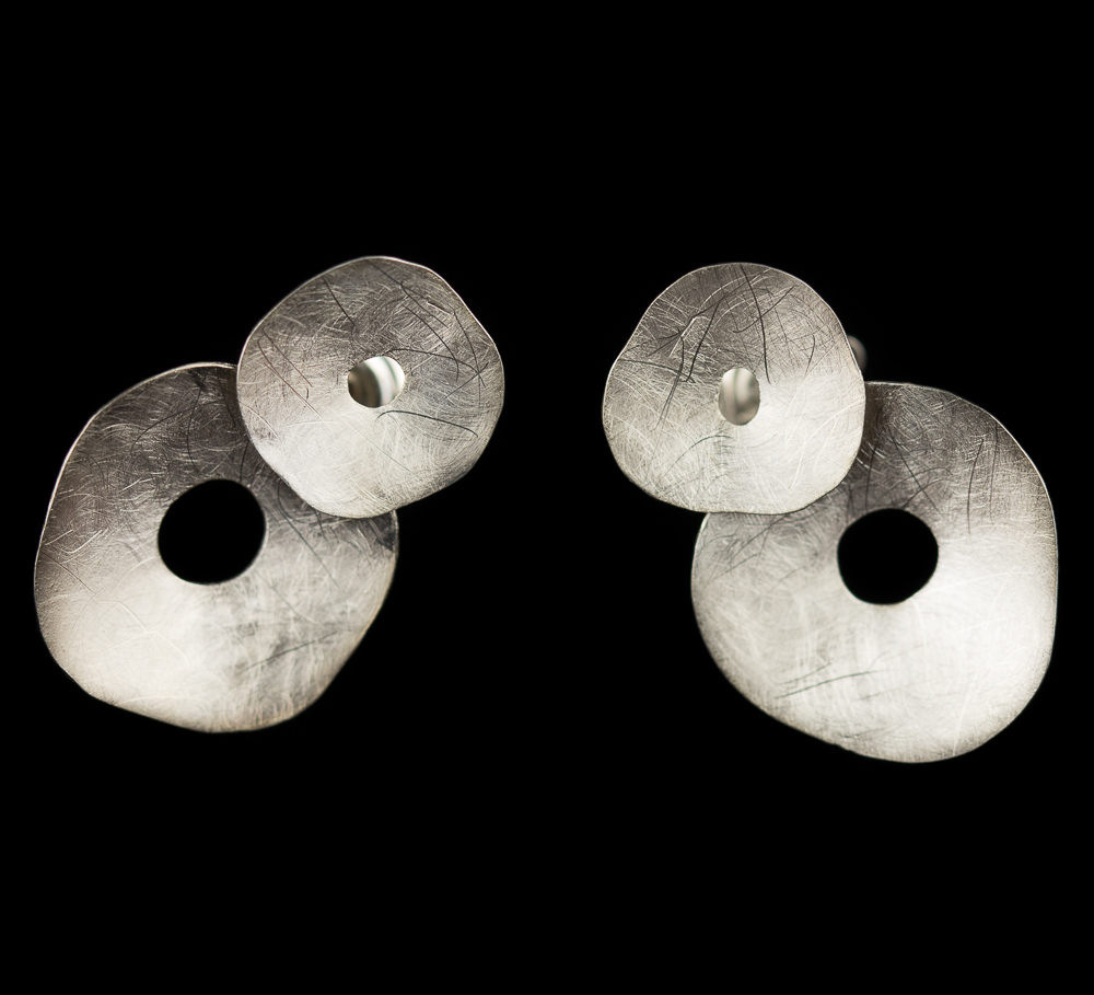Silver and frosted earrings of two circles