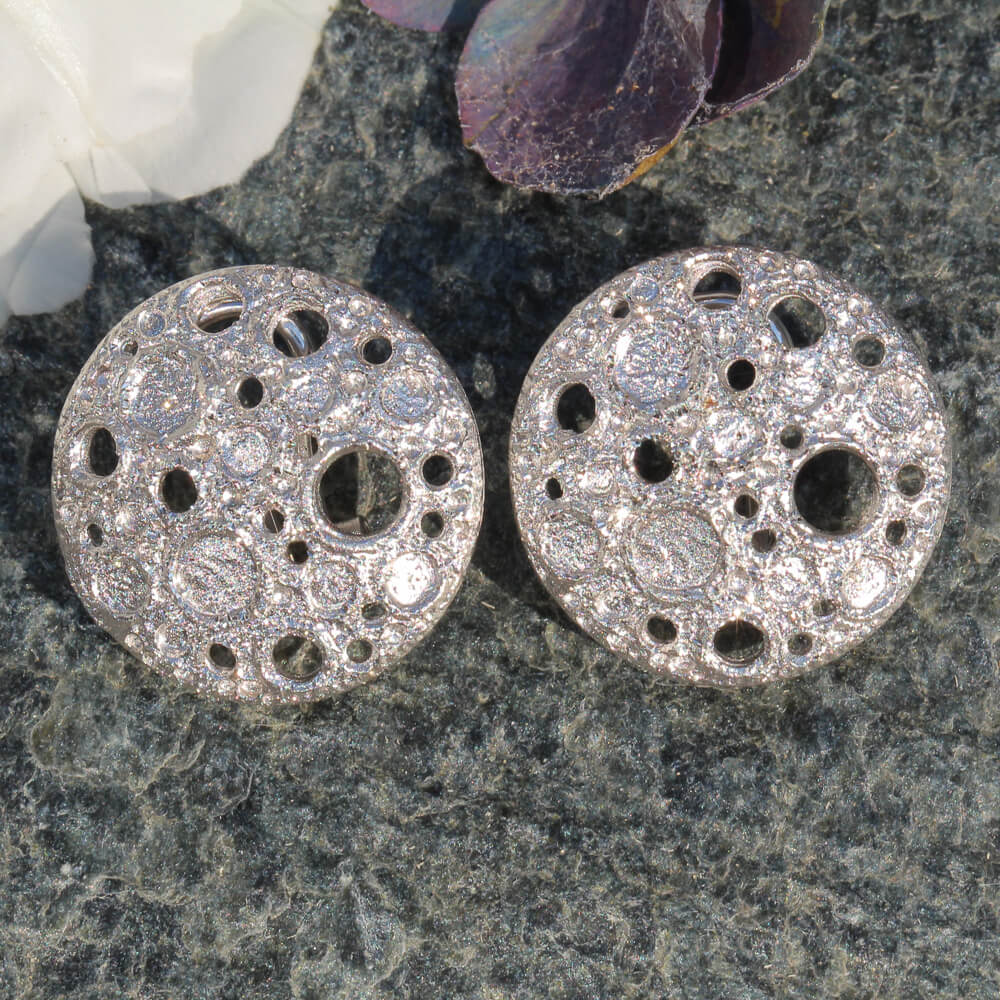 Refined silver earrings with crafted glare